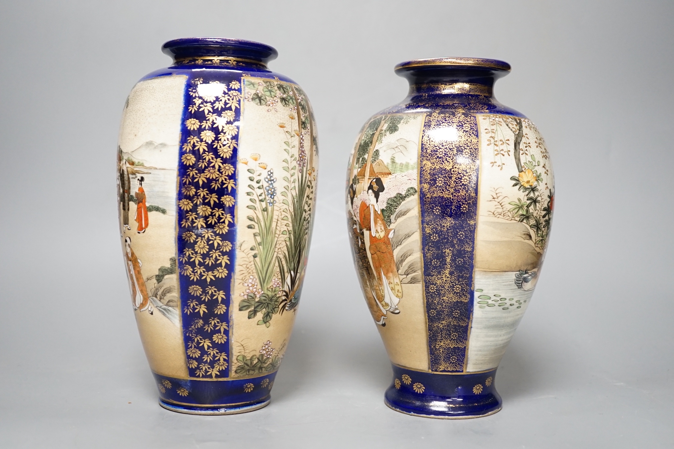 A pair of Japanese Satsuma pottery vases, one signed Kinkozan - 25cm high
